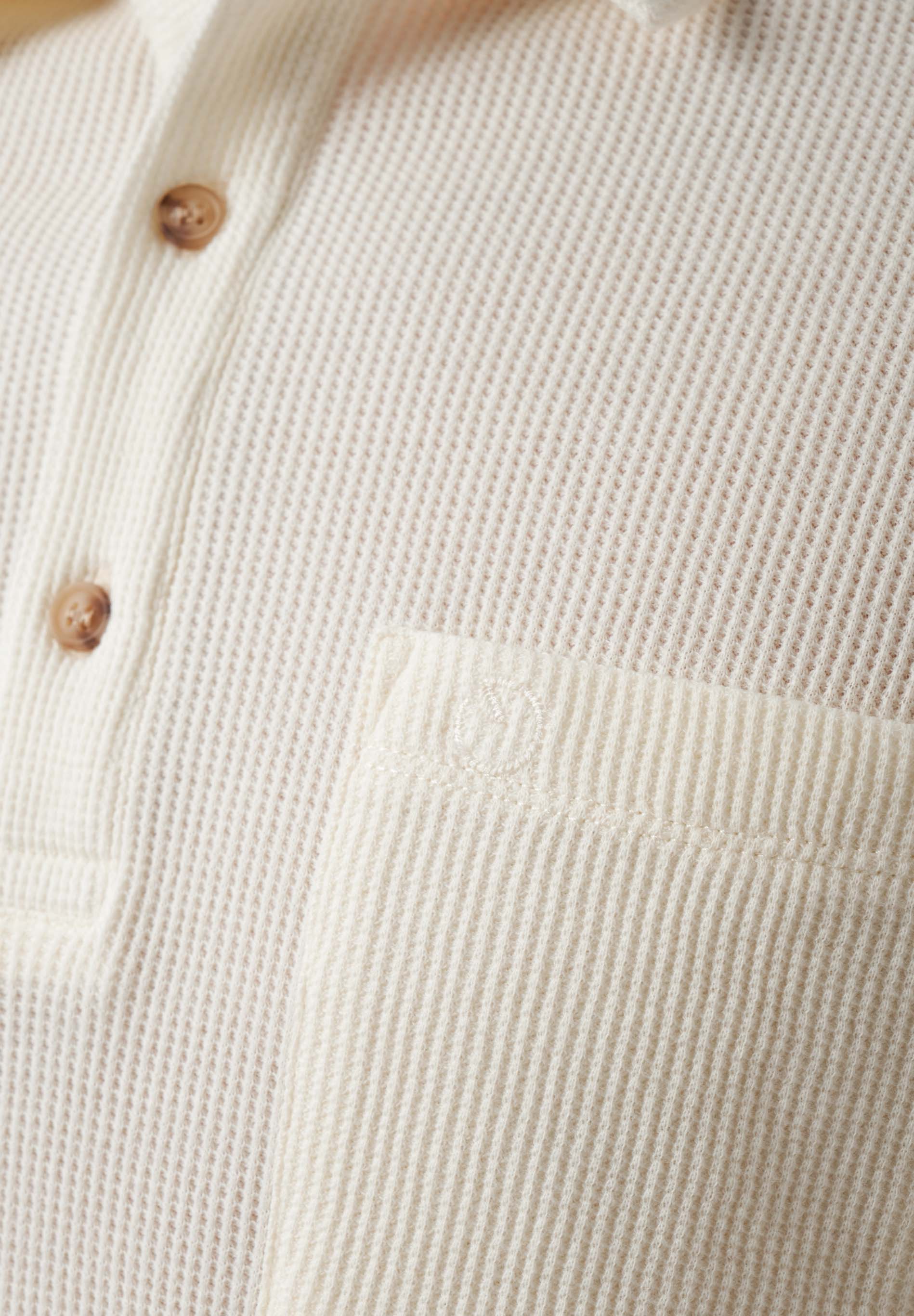 Poloshirt aus Bio-Baumwolle mit Waffelstruktur